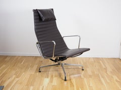 VITRA EAMES ALU CHAIR EA 124 with Ottoman in chocolate brown LEATHER