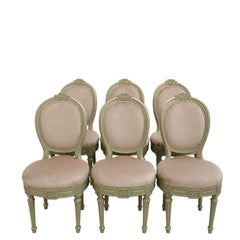six chaises médaillons d'époque Louis XVI en hêtre laqué vert – XVIIIᵉ siècle