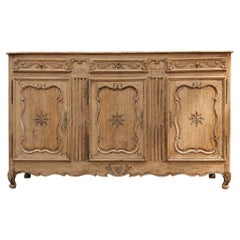 Buffet trois portes en chêne sculpté fin XVIIIe siècle