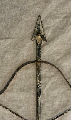 Pair of Patinated Tole Archer or Crossbow Form Candle Holders