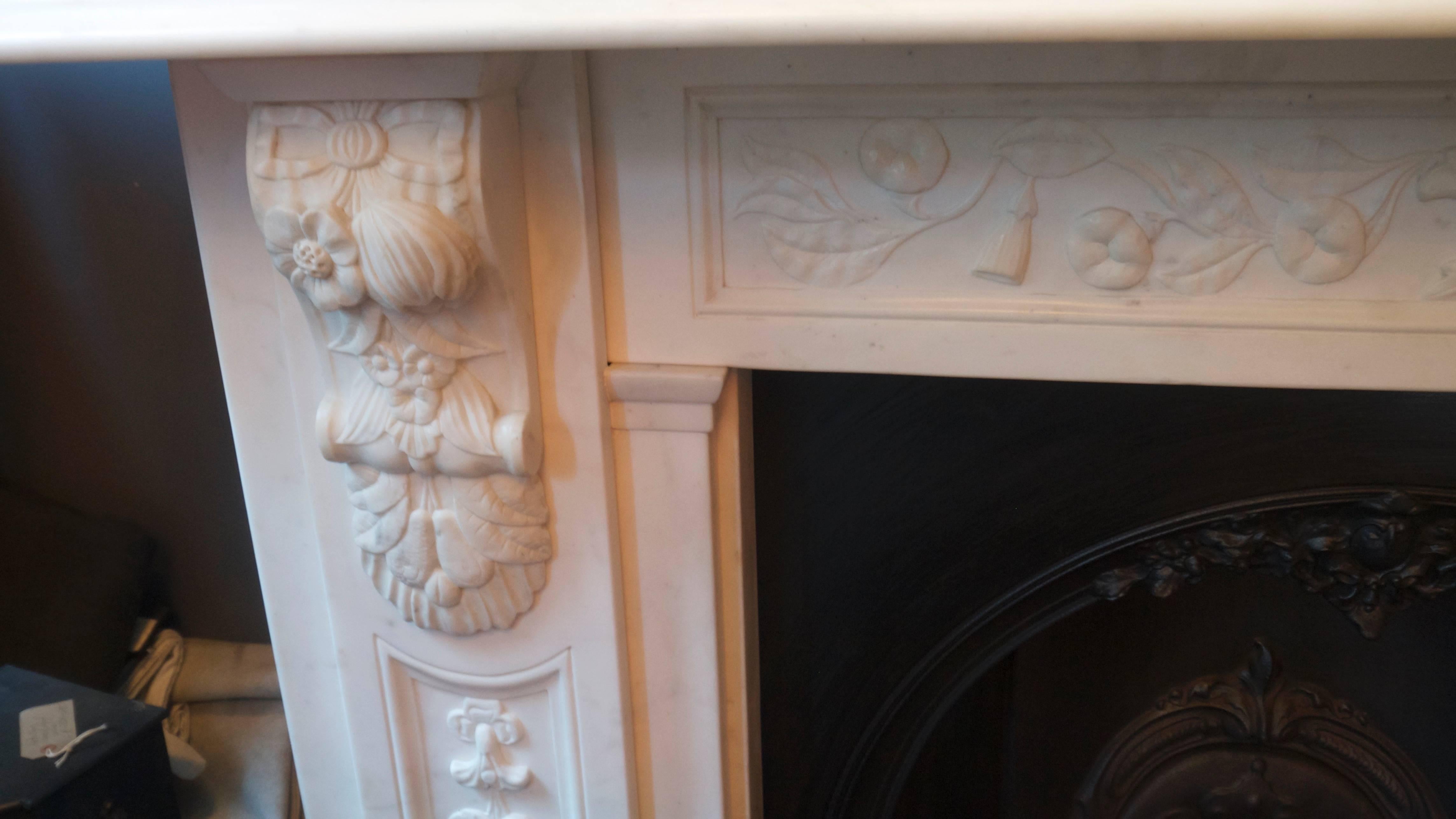 Original antique Statuary white Victorian marble corbel fireplace mantelpiece with carved frieze, legs and corbels. Opening size 35.75