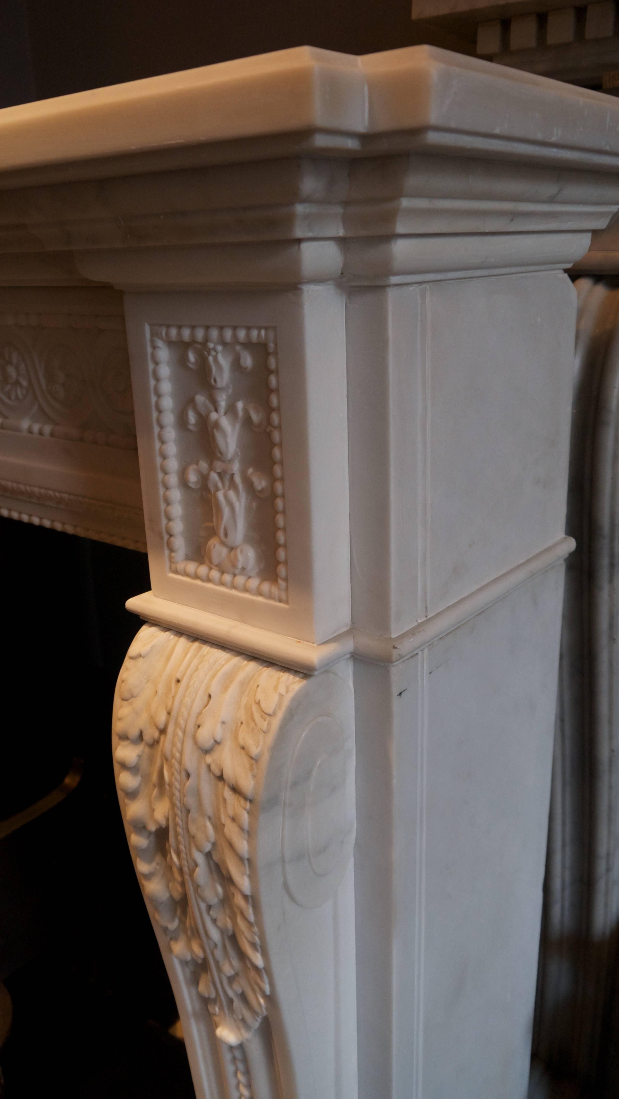 French Very Impressive Heavily Carved Louis XVI Marble Surround