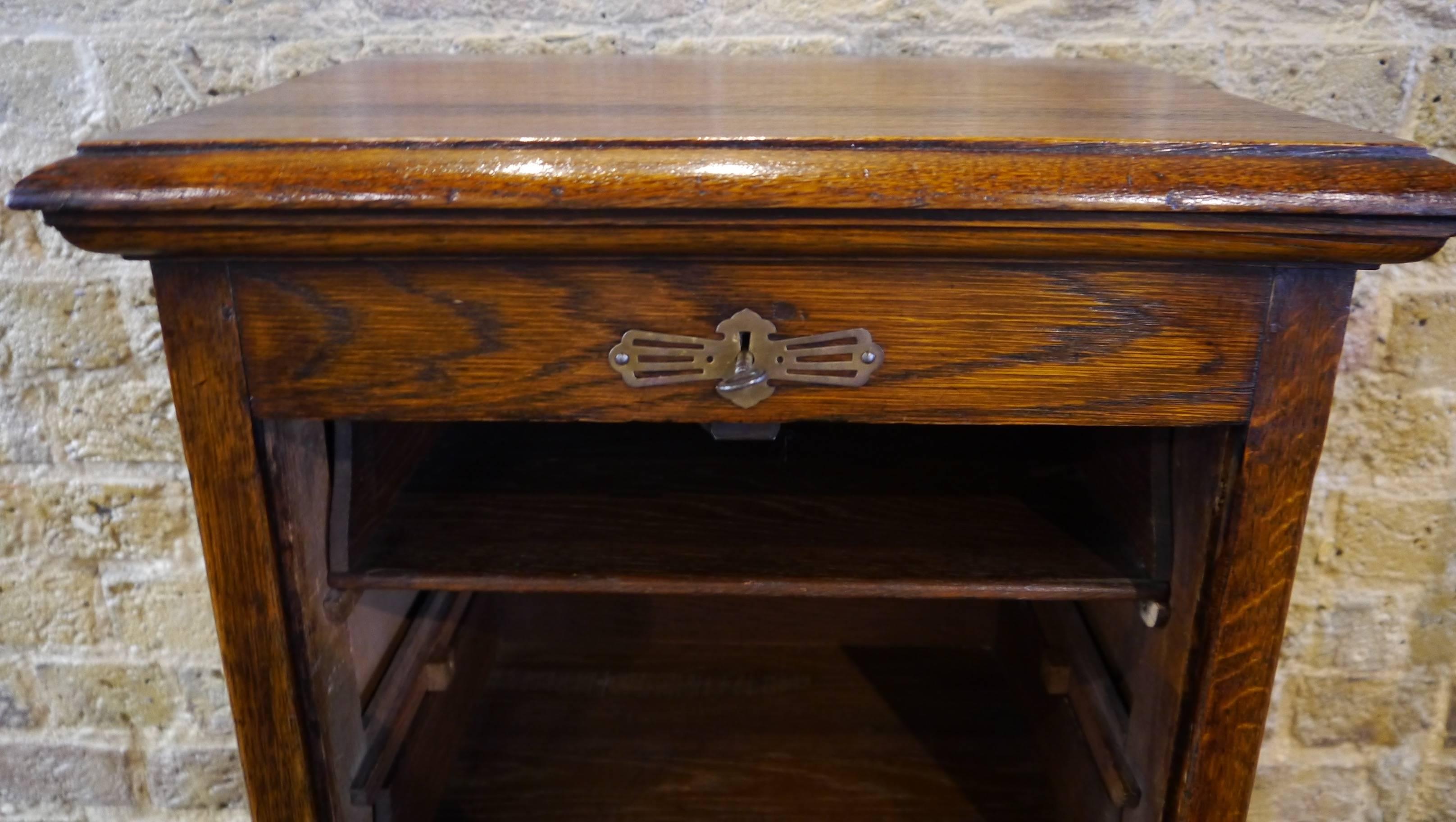 Concertina front oak filing cabinet.