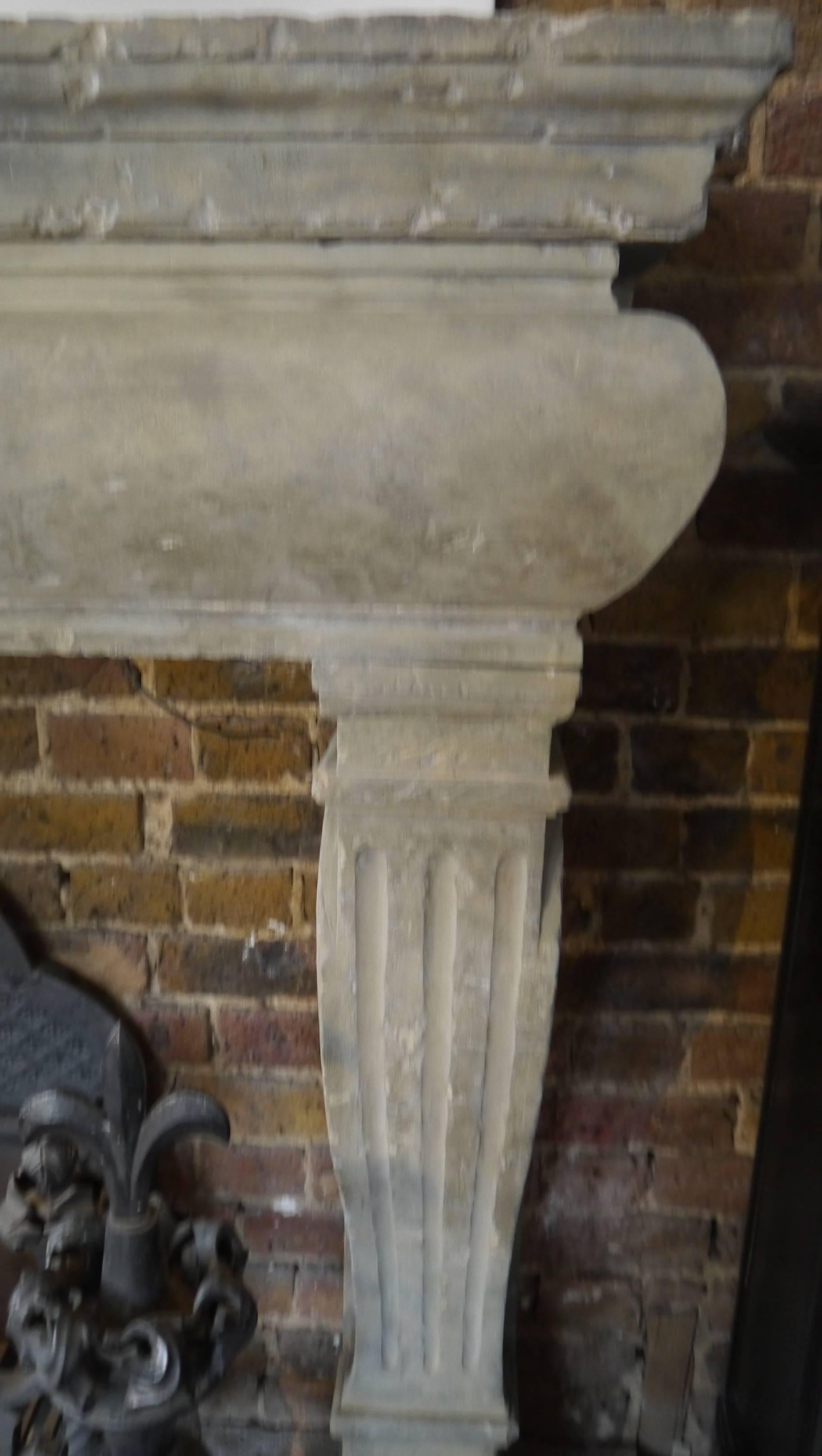 Late 18th century antique stone fireplace. Opening 40 W x 38.5 H.