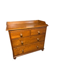 Victorian English Pine Chest of Drawers, with bun feet & decorative gallery back
