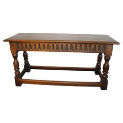 English Oak long joint stool or bench, C. 1900, with a decorative frieze.