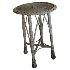 American Bar Harbor Wicker Round Table, c 1900, with pineapple feet