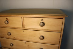 English pine chest of drawers, 19th C, with the original key