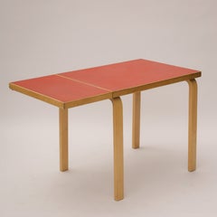 Mesa de comedor «Red Drop Leaf» de Alvar Aalto para Artek, década de 1950