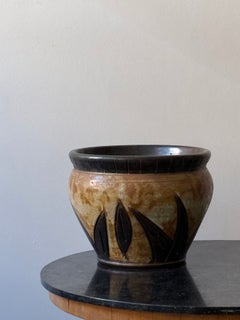 A large striking Art Deco cache-pot by Polydore Losson