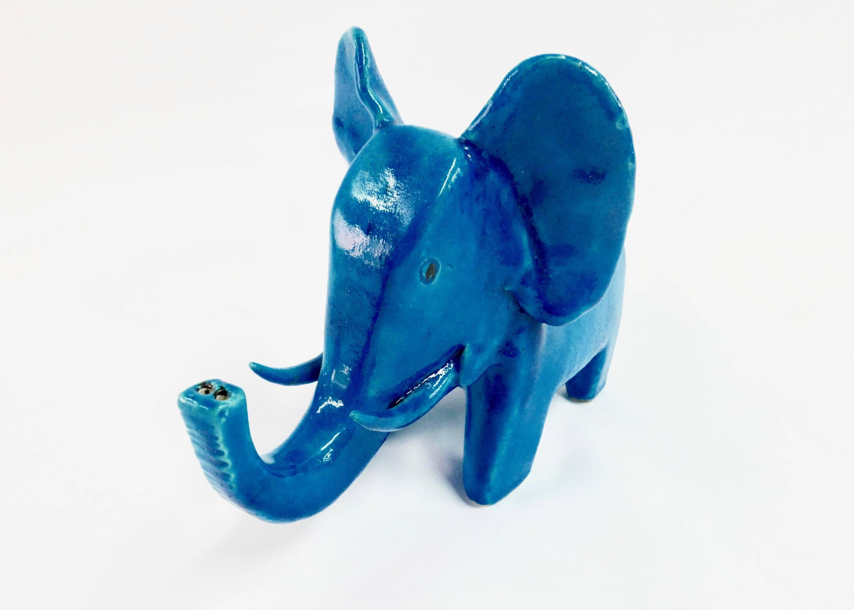 Bright blue elephant by Bruno Gambone. Produced by the artist in the late 1950s and signed Gambone, Italy.