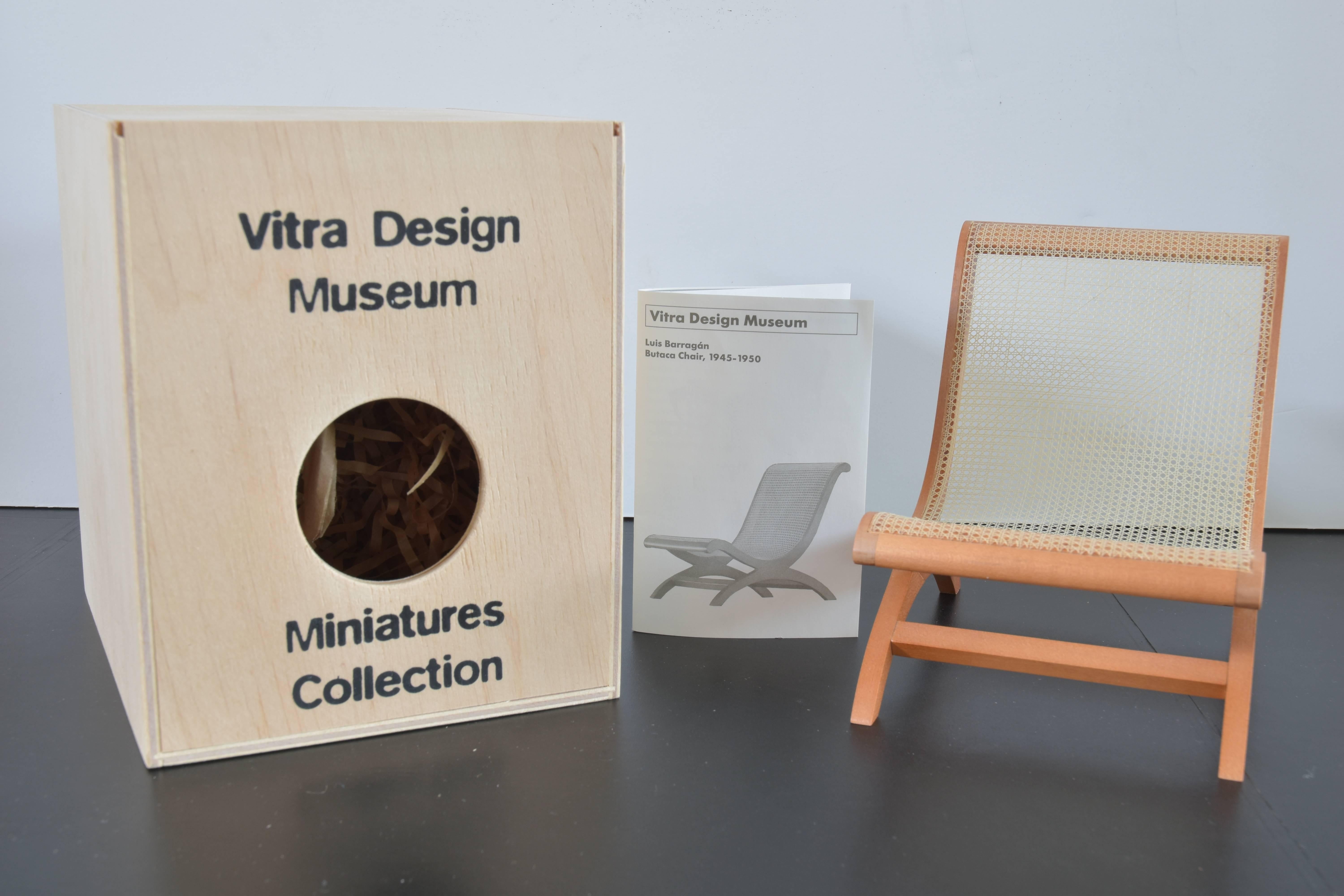 From the Vitra design museum miniatures collection a Luis Barragan Butaca chair originally produced, 1945-1950.

This miniature model includes the Vitra design museum wooden box and historical brochure which includes a narrative of the designer as