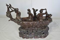 Cast Bronze Sculpture of Men in a Boat on a Carved Wooden Base, Signed