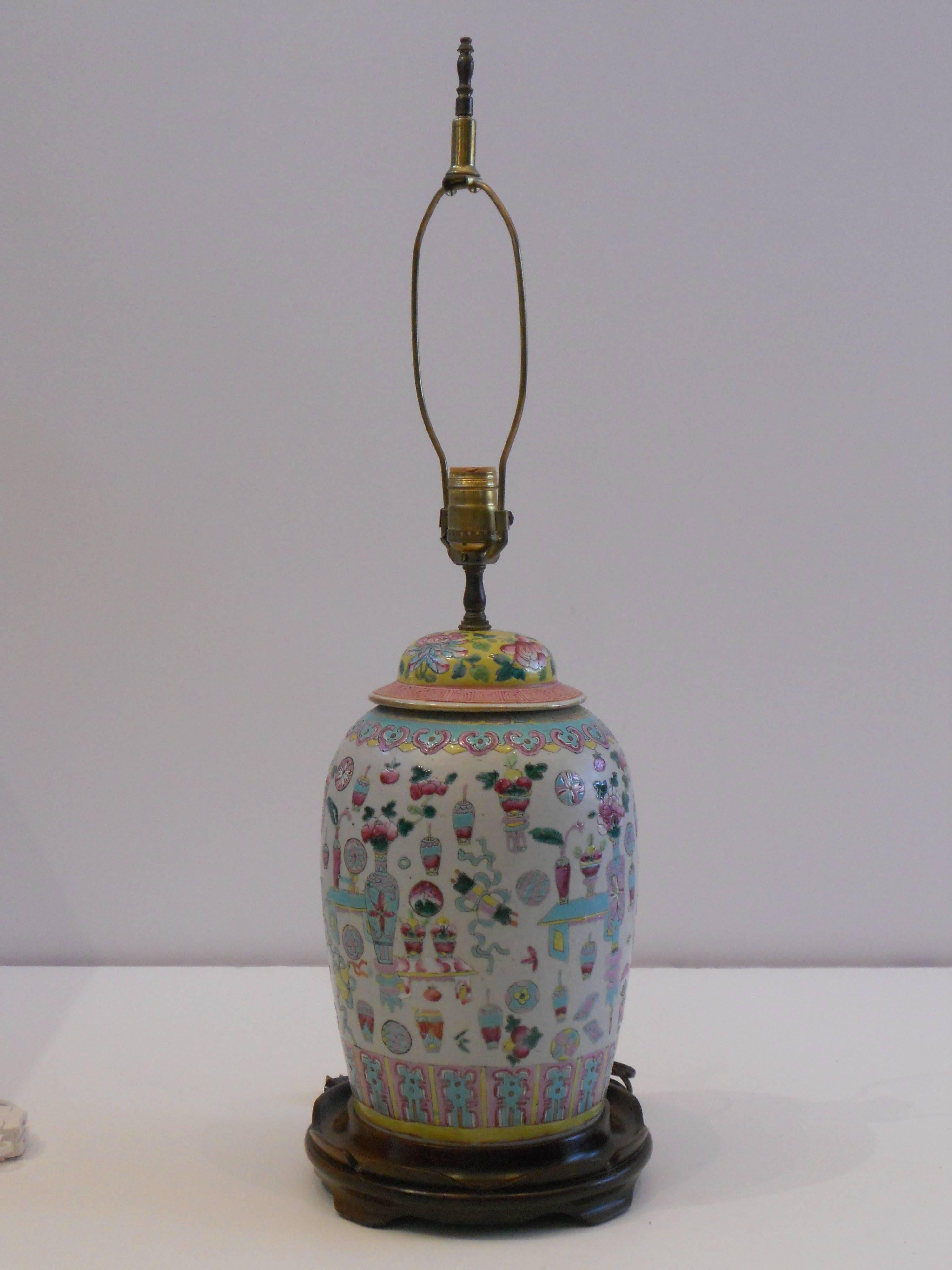 Chinese vase as a lamp in shades of pale pink, aquamarine and soft yellow.