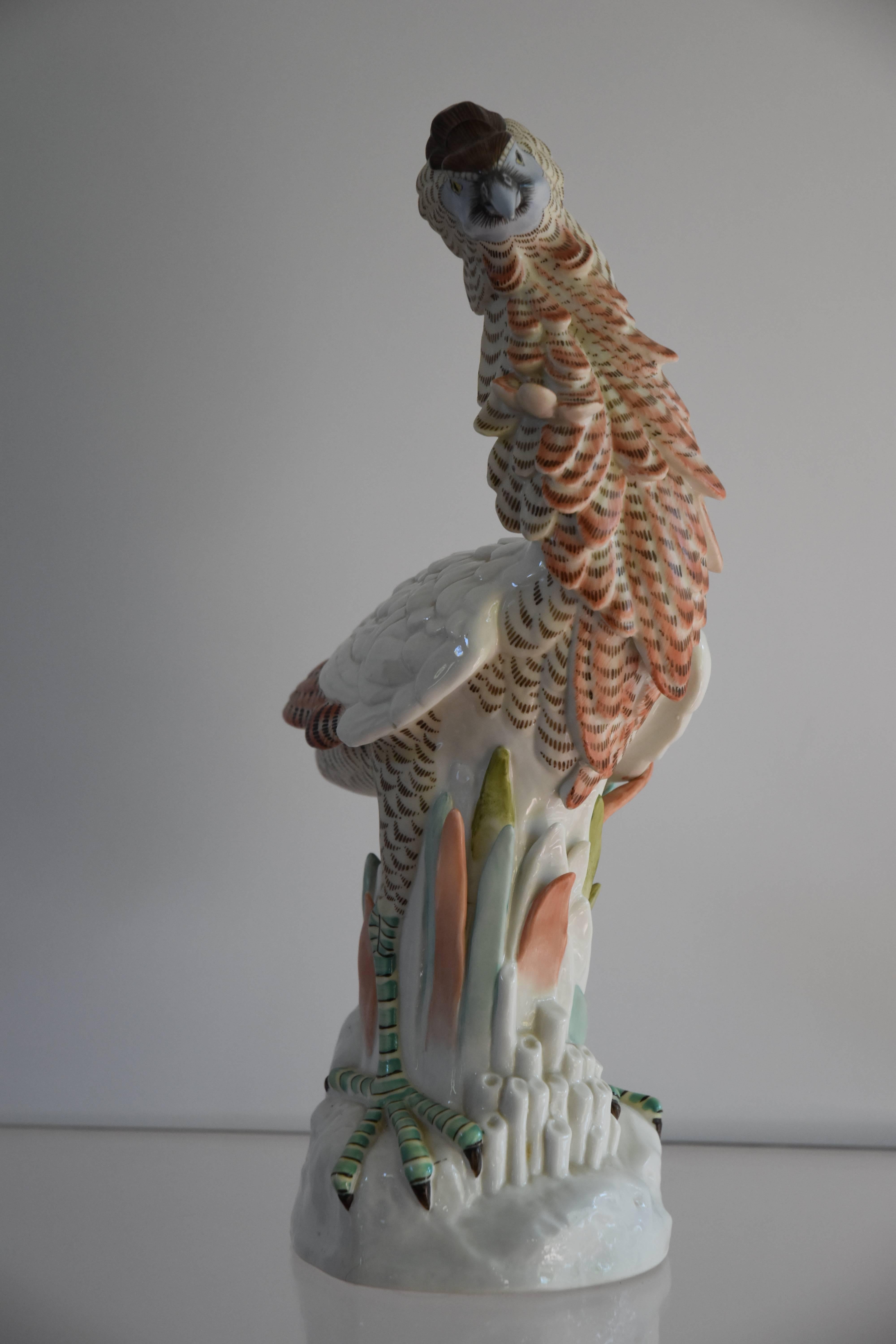 An elegant porcelain bird in the style of Mottahedeh.