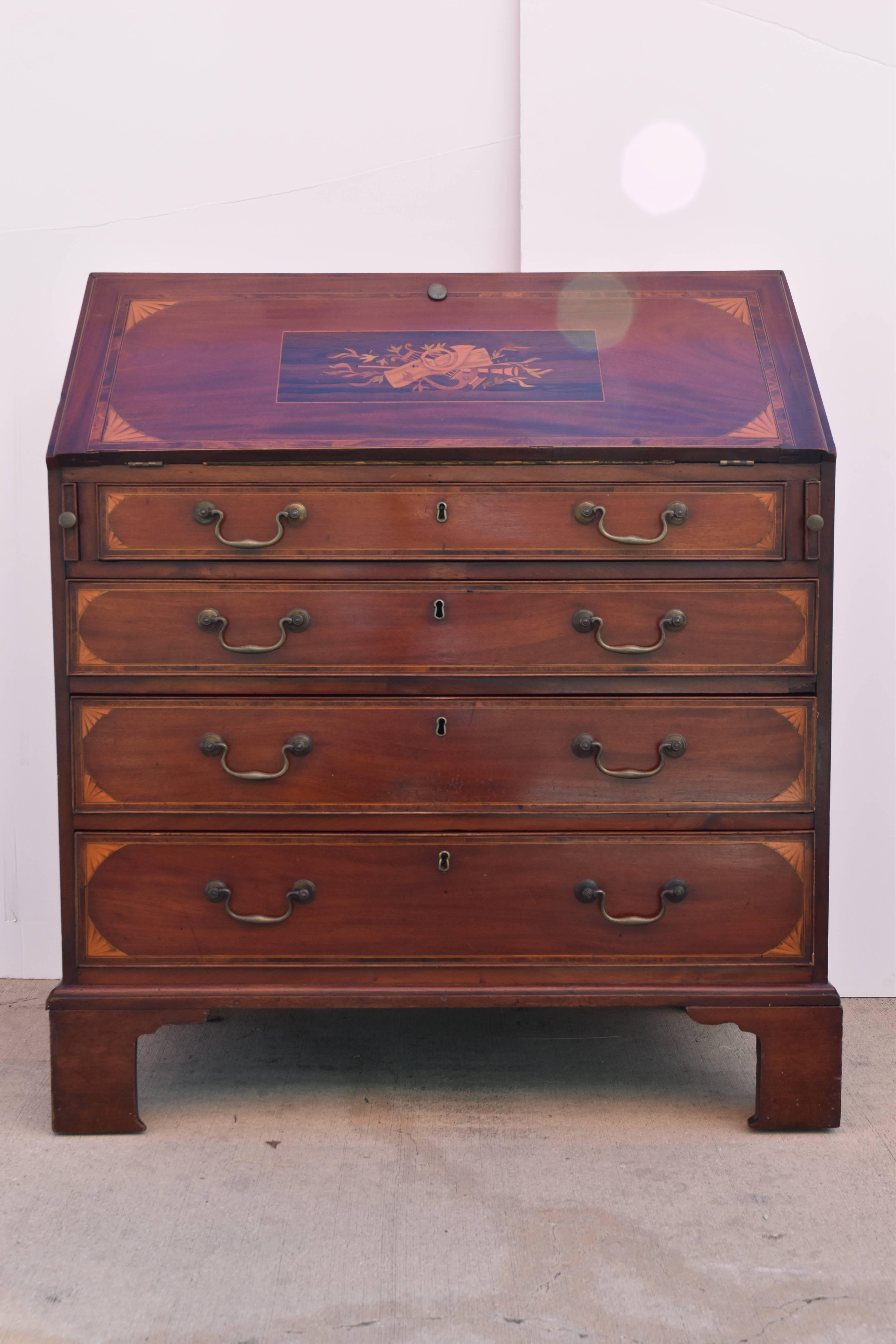 A beautifully detailed drop front secretary with a drop front and leather top writing surface.

Depth is 35.5