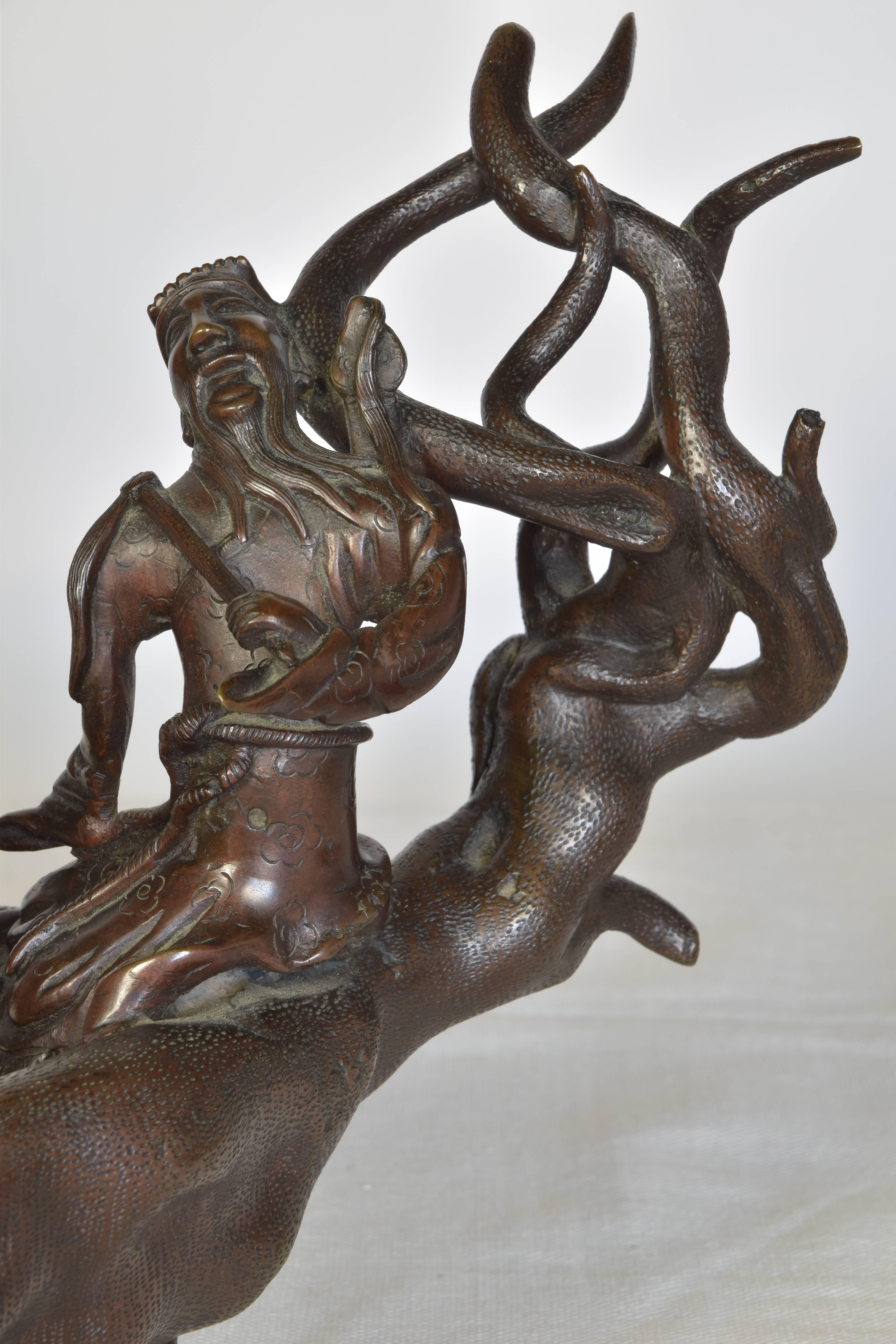 Cast Bronze Sculpture of Men in a Boat on a Carved Wooden Base, Signed In Excellent Condition For Sale In San Antonio, TX