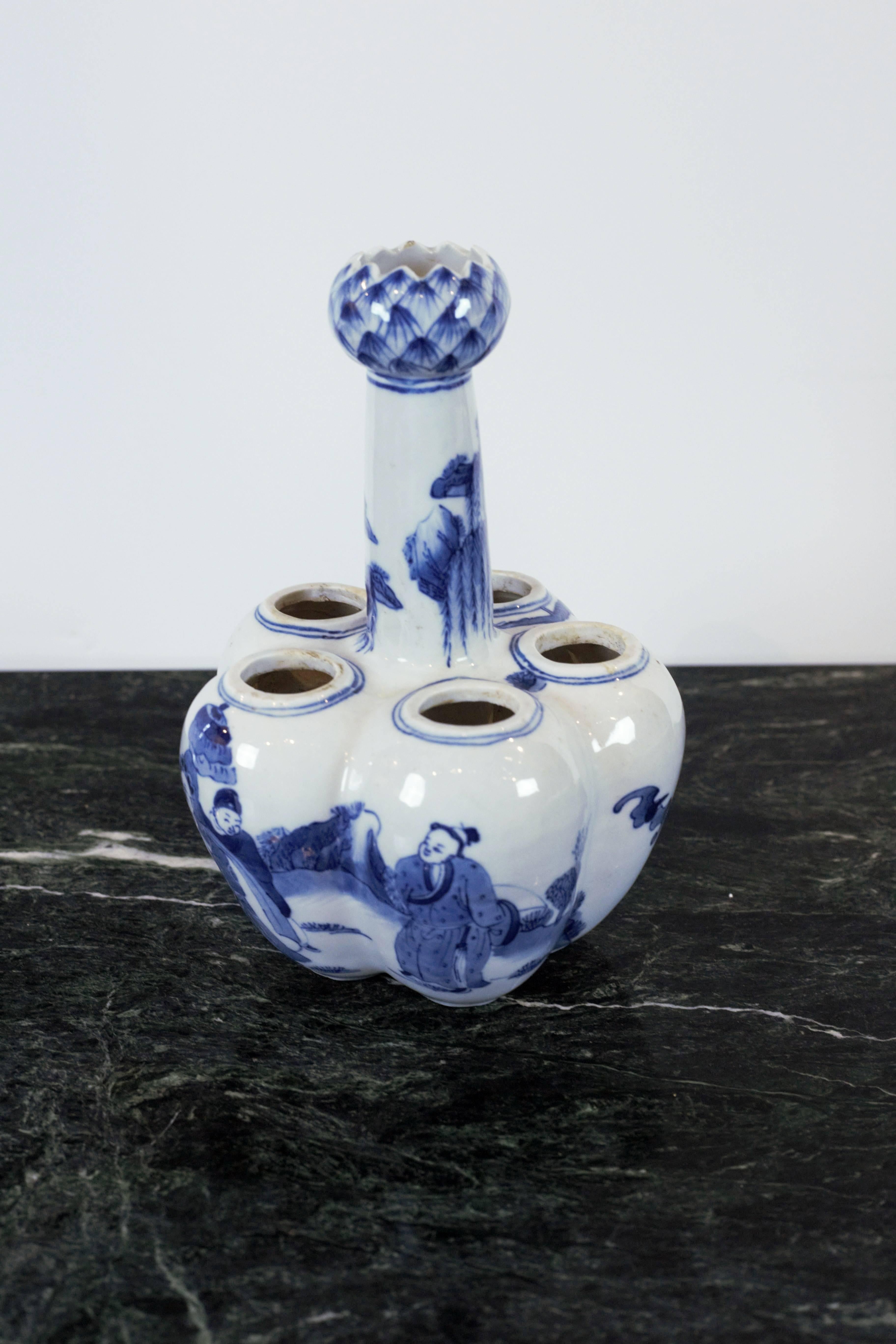 Charming hand-painted blue and white porcelain tulip vase with painted figural scenes.