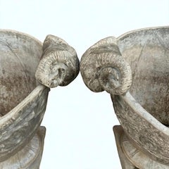 !9th century English cast lead ram's head large planters urns