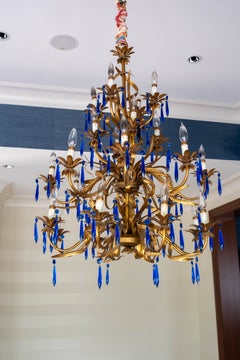 Pair of Vintage Italian Toleware Gilt Chandeliers with Blue Crystal Prisms, circ