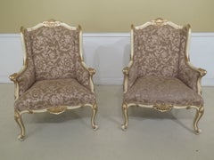 Pair of French Louis XIV Style Gilt Armchairs with Matching Ottomans, circa 1990