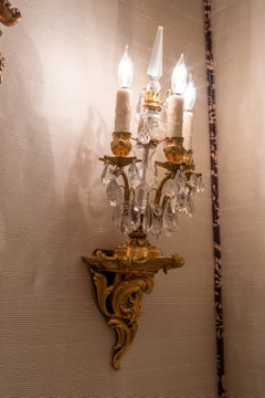 Pair of 19th Century French Gilt Bronze and Crystal Three-Light Wall Sconces, ci
