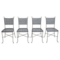 Set of Four French Bistro Style Woven Metal Dining Chairs, circa 1950s