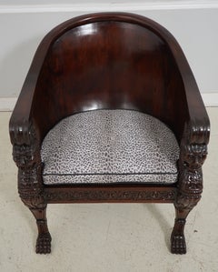 Monumental Ornately Carved Barrel Back Throne Chair with Figural Details