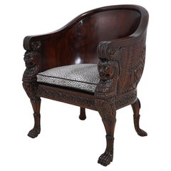 Monumental Ornately Carved Barrel Back Throne Chair with Figural Details