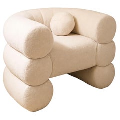 CONCENTRICO 01 Sculptural Lounge Chair in Textured Upholstery by En Bruto