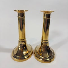 Pair of English Oval Base Faceted Brass Candlesticks