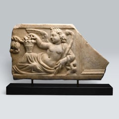 A Roman Marble Sarcophagus Lid Fragment of a Season, circa 3rd century AD