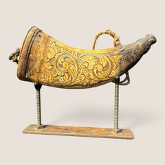Profusely Carved Figural Powder Horn