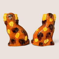 Pair of 19th C. Slip-Decorated Pennsylvania Redware Spaniels