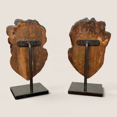 Coppia di cherubini antichi in legno intagliato