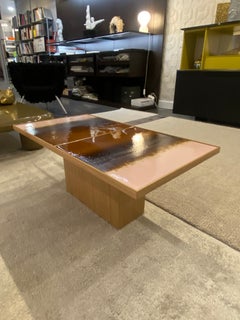 Sculptural coffee table with a glazed ceramic top
