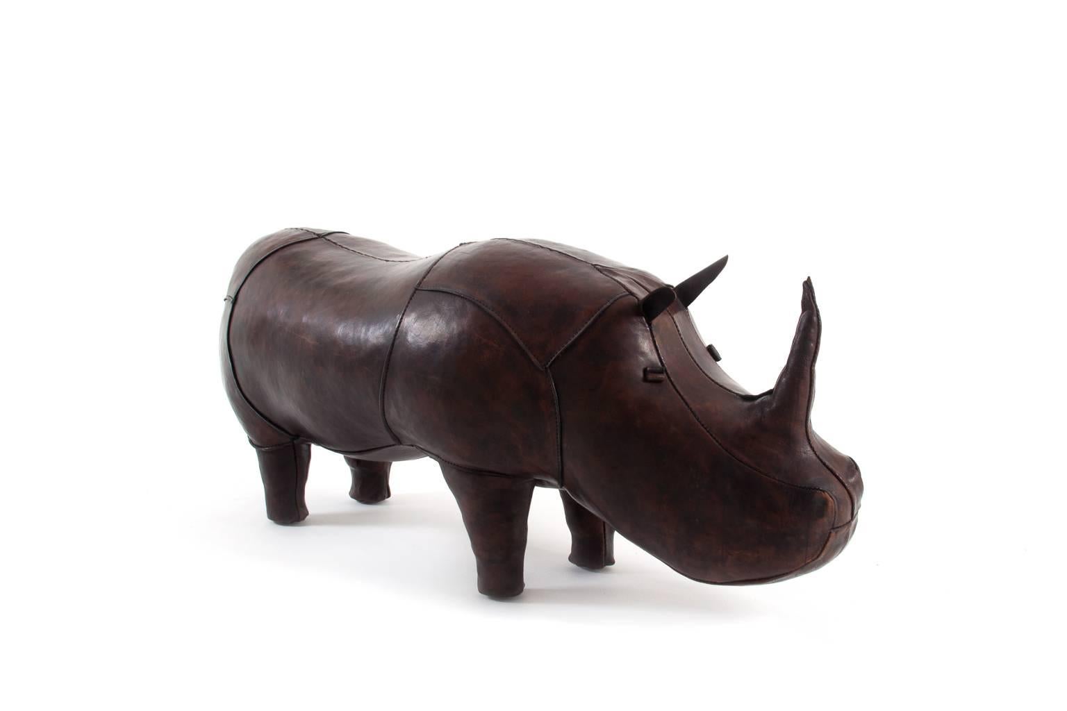 Original leather rhinoceros footstool by Dimitri Omersa for Abercrombie & Fitch, London, 1960. Handcrafted from the best quality cowhide leather, filled with hay. Beautiful original piece, signed 'Made in England.' Collectors item with a lovely