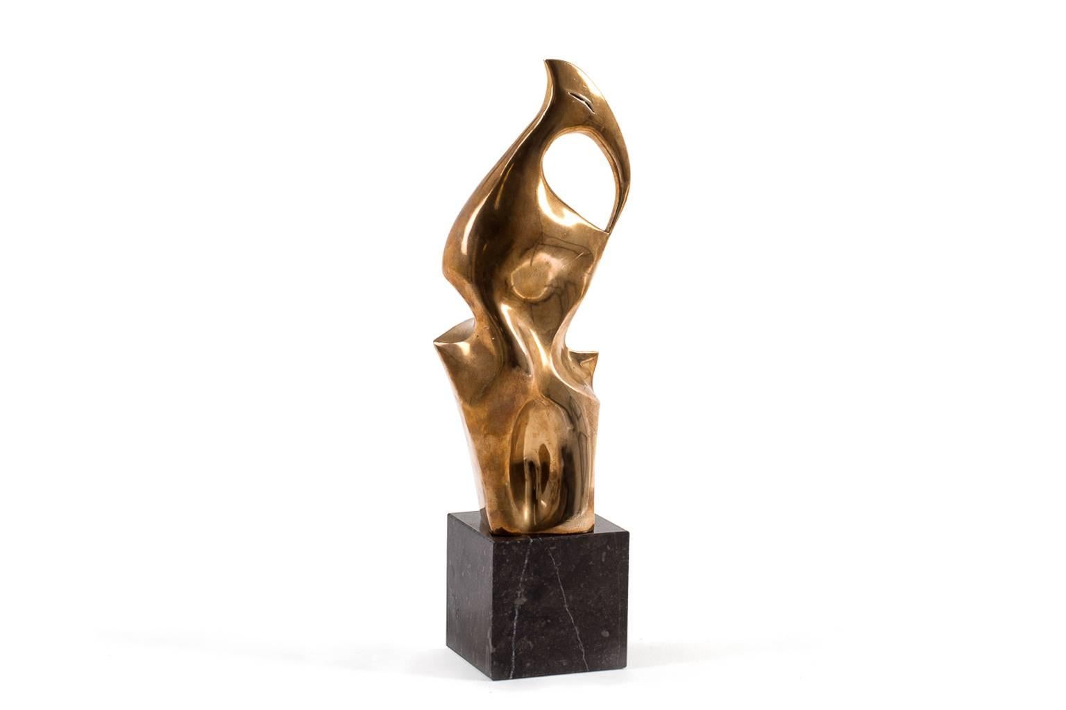 Impressive bronze sculpture, 1970s. Heavy piece made of cast bronze with a lovely natural patina on a black marble console. Beautiful details of artistic expression. Marked by the artist; Maricarmen 2/10. In excellent condition.
 
