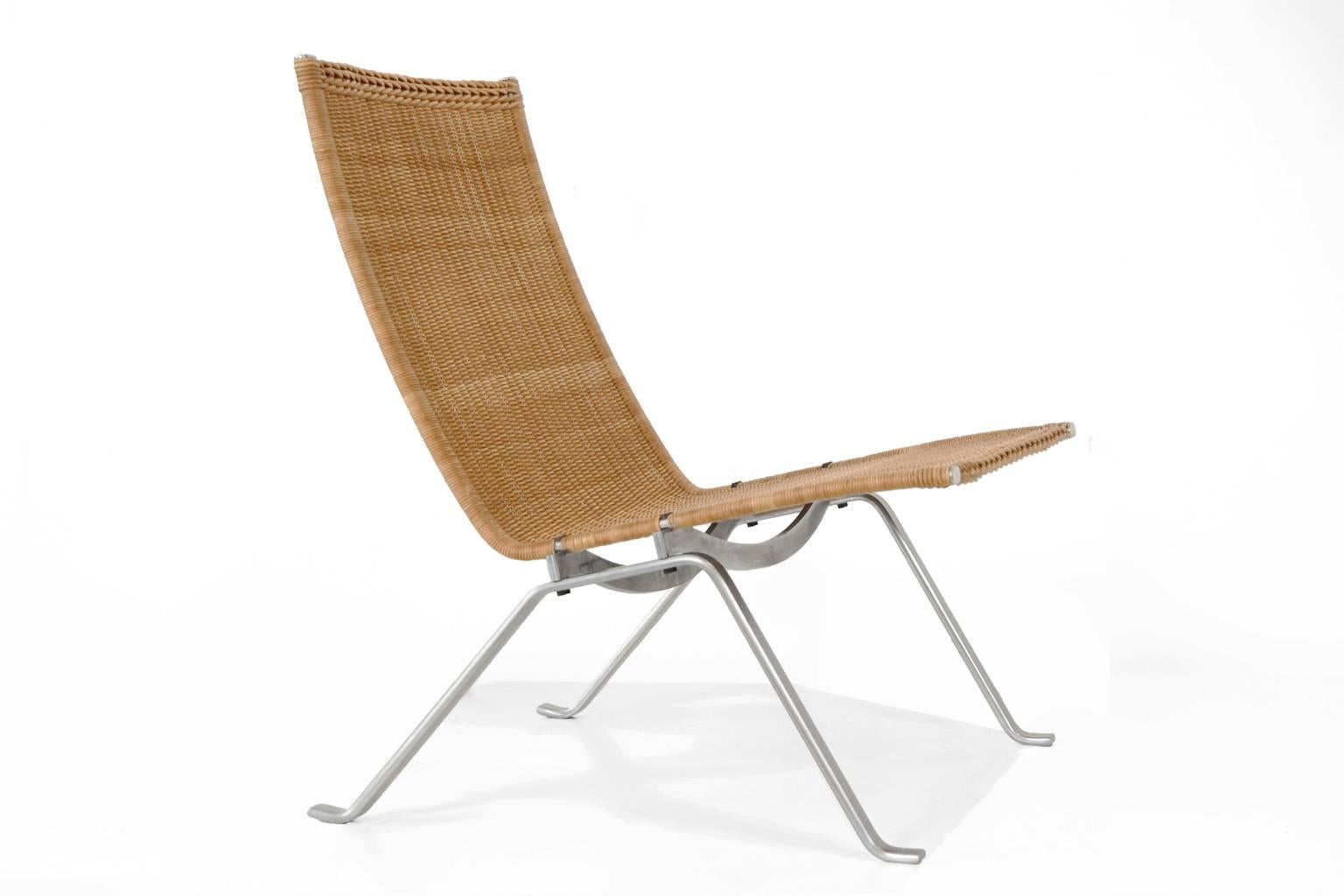 Rare first edition wicker PK 22 lounge chair designed by Poul Kjærholm for E. Kold Christensen, Denmark 1955. The PK22 is one of Kjaerholms masterworks. This is an old production from E. Kold, the manufacturer since the late fifties till the