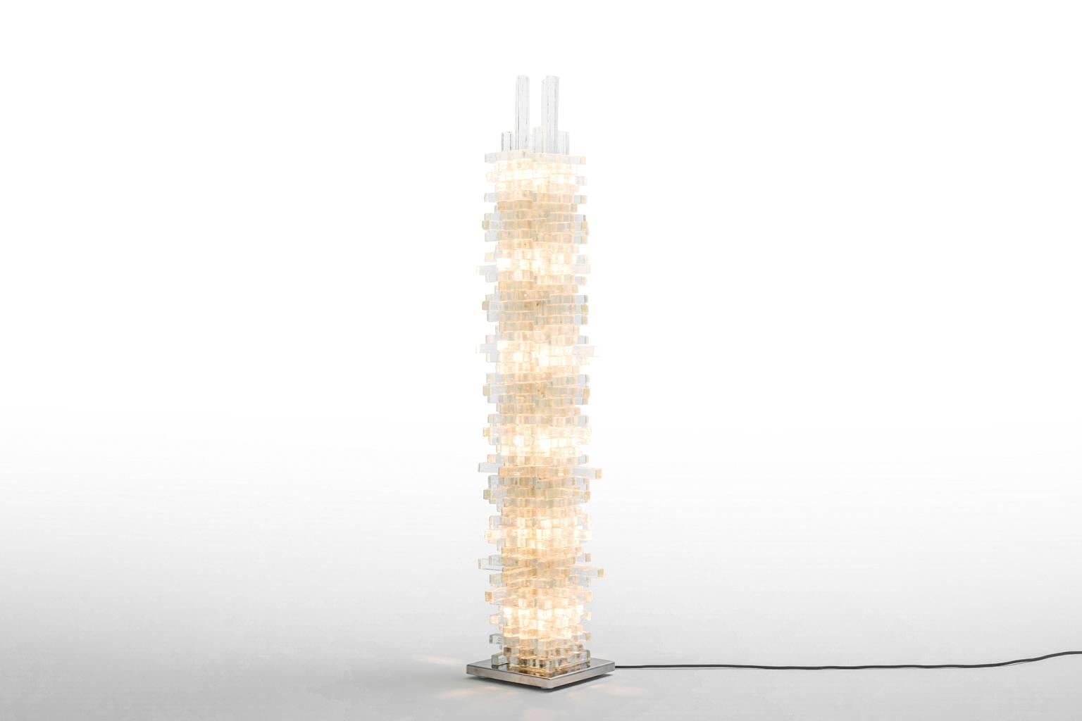 Exceptional floor lamp by Poliarte, Italy, 1960s. Made from stacked Murano glass rods all handcrafted with each their own unique structure. The lamp stands on a polished stainless steel base. Provided with six E14 light fittings for a balanced