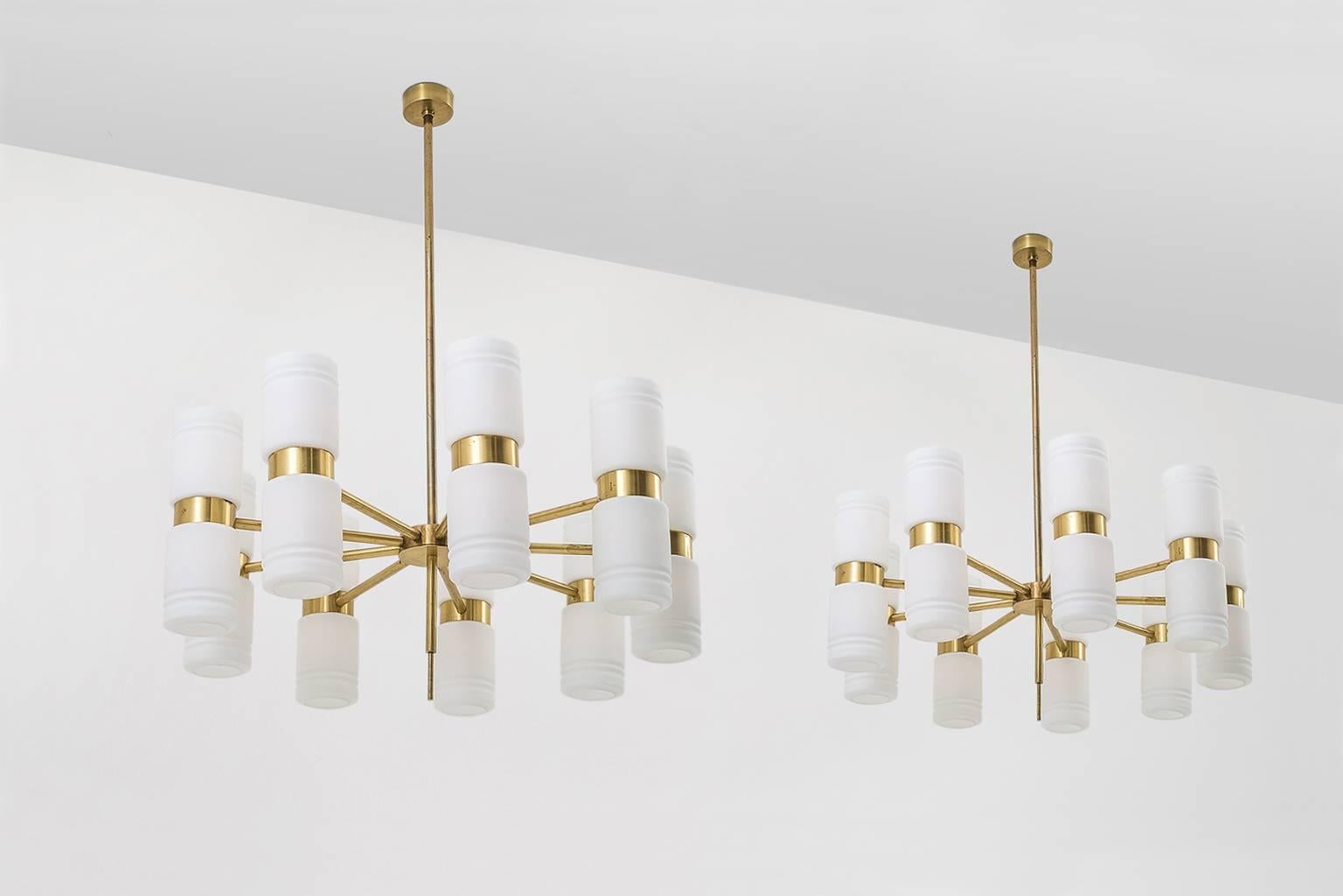 Beautiful extra large Swedish chandeliers out of solid brass. High quality production specially made for a luxurious theater in the 1960s. Designer unknown but they could be designed by Hans-Agne Jakobsson, regarding the design and the quality. The