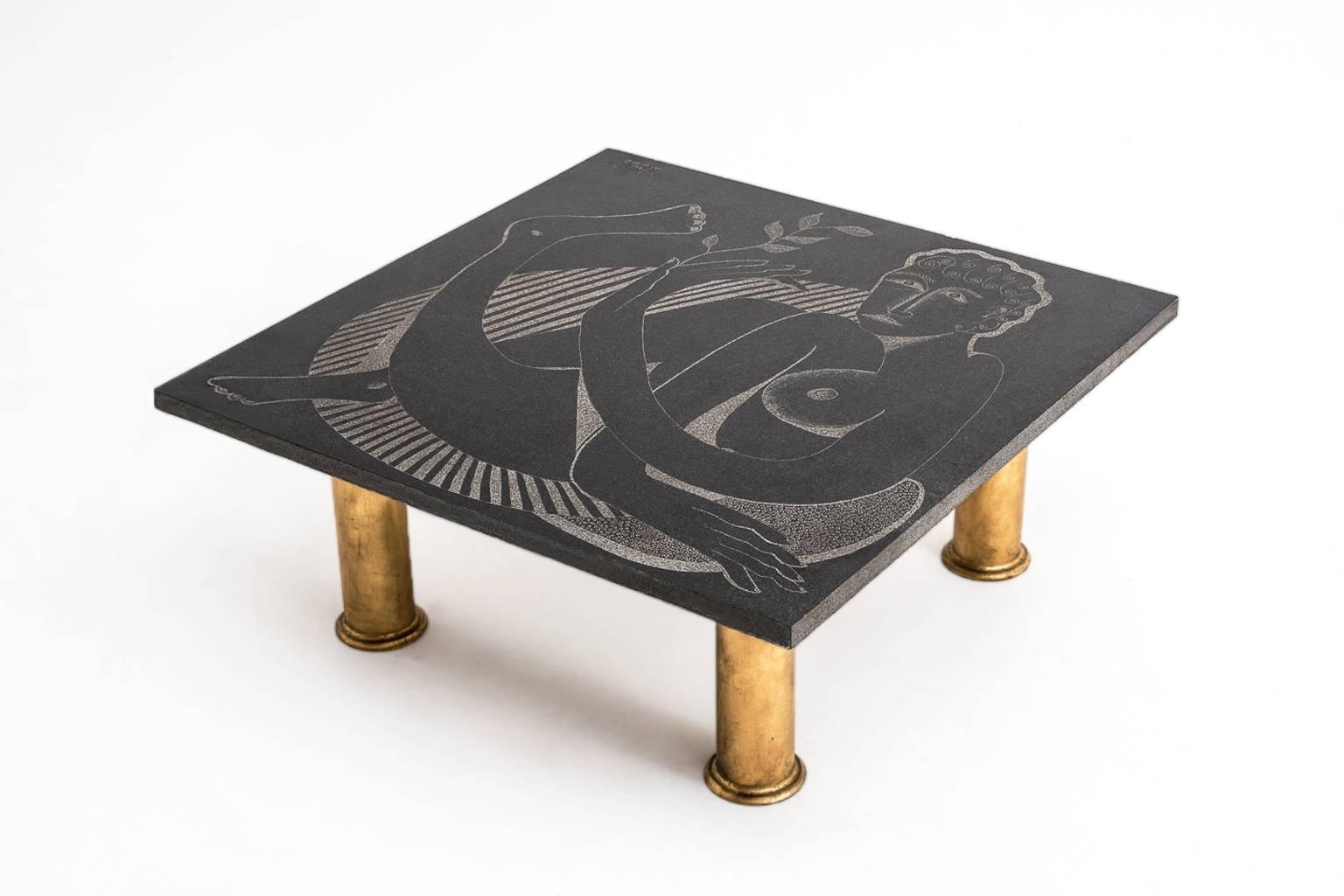 Granite coffee table by artist Guy de Jong. De Jong is born in Brussels in 1945 he studied at the Royal Academy of Fine arts. De Jong lives and works in a small village in the beautiful mountains above the Lake Como. The top of the table is made