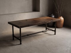 Rustic Reclaimed Wood Coffee Table on Blackened Iron Pipe Base