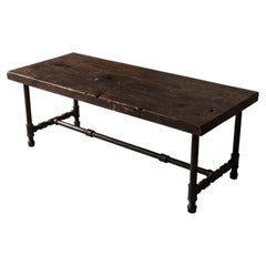 Rustic Reclaimed Wood Coffee Table on Blackened Iron Pipe Base