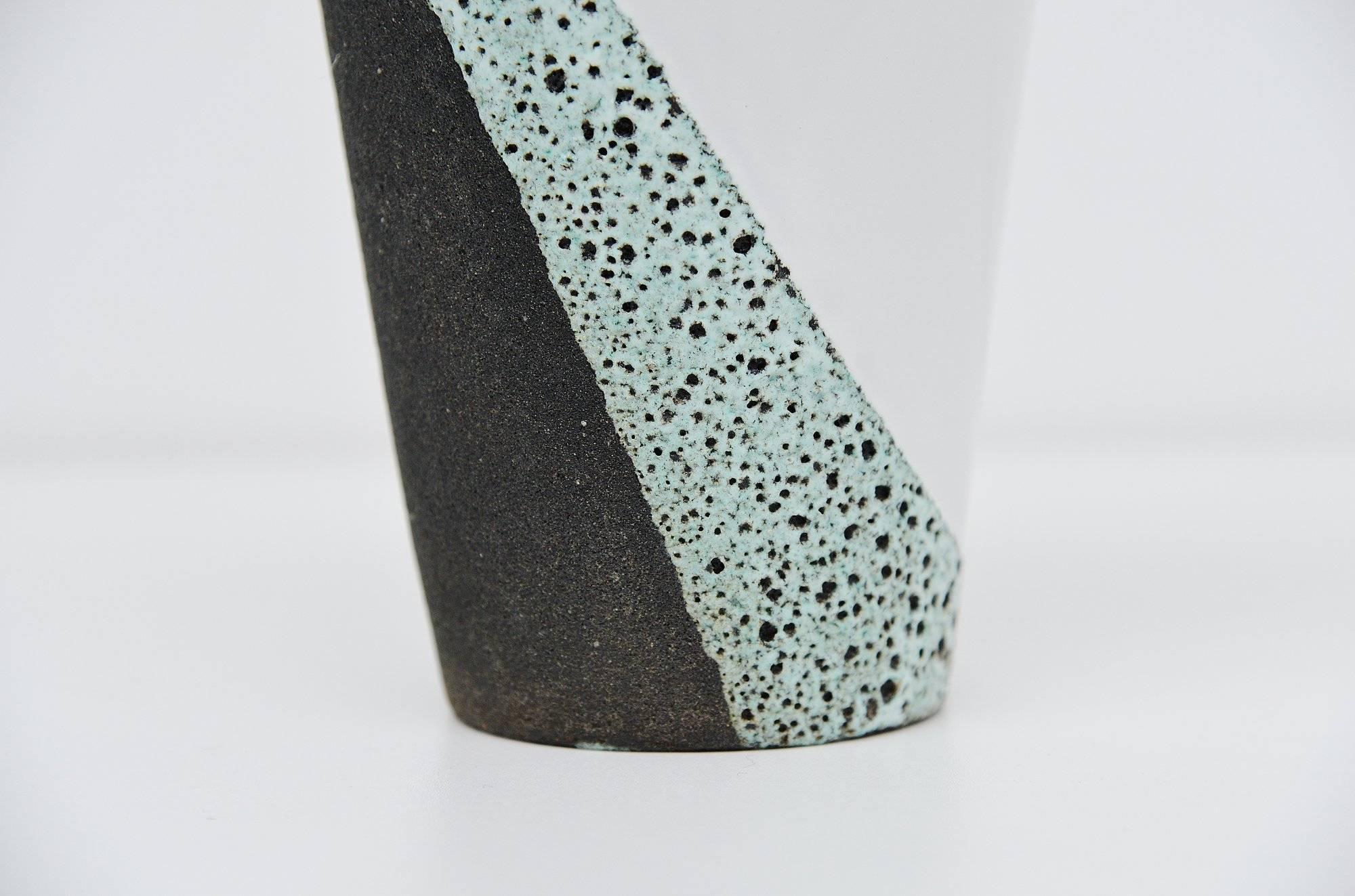 Very nice large ceramic vase designed by Ettore Sottsass Jr. for Bitossi, Italy, 1950. These ceramics objects were commissioned by the prominent Dutch department store ‘De Bijenkorf’ in 1958. The very nice and typical thick lava glaze is very