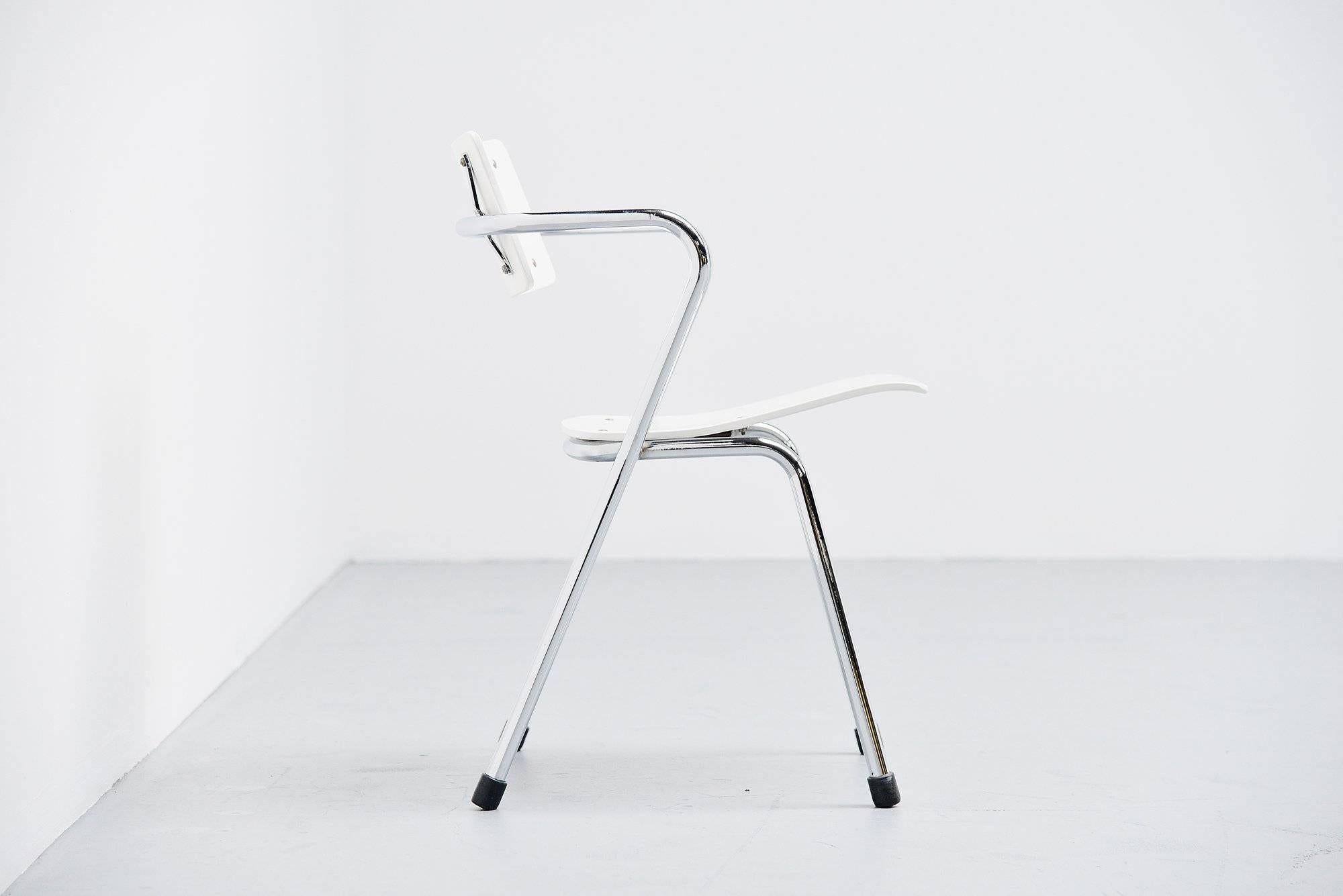 Very important industrial stacking chair model 9507/1, designed by Friso Kramer for Ahrend de Cirkel in 1953. This chair has a chrome-plated tubular metal frame and a white lacquered seat and back. This chair was also available in upholstered