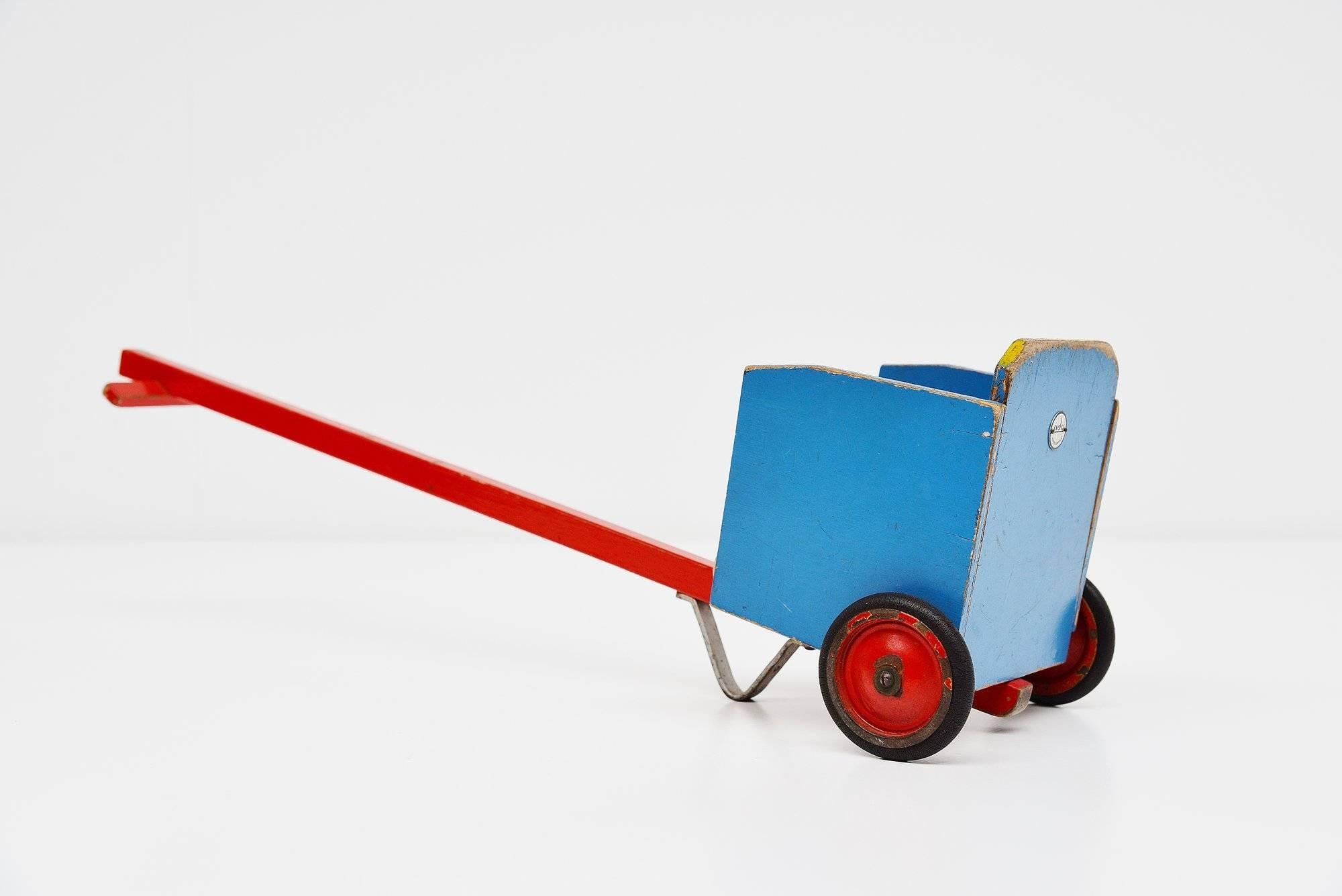 Very nice and toy kart designed by Ko Verzuu for Ado Holland in 1950. Ado means Arbeid door onvolwaardigen, translated; labor by incapacitated, which makes this an even more special piece. Toys by Ado are being highly collected at the moment, even