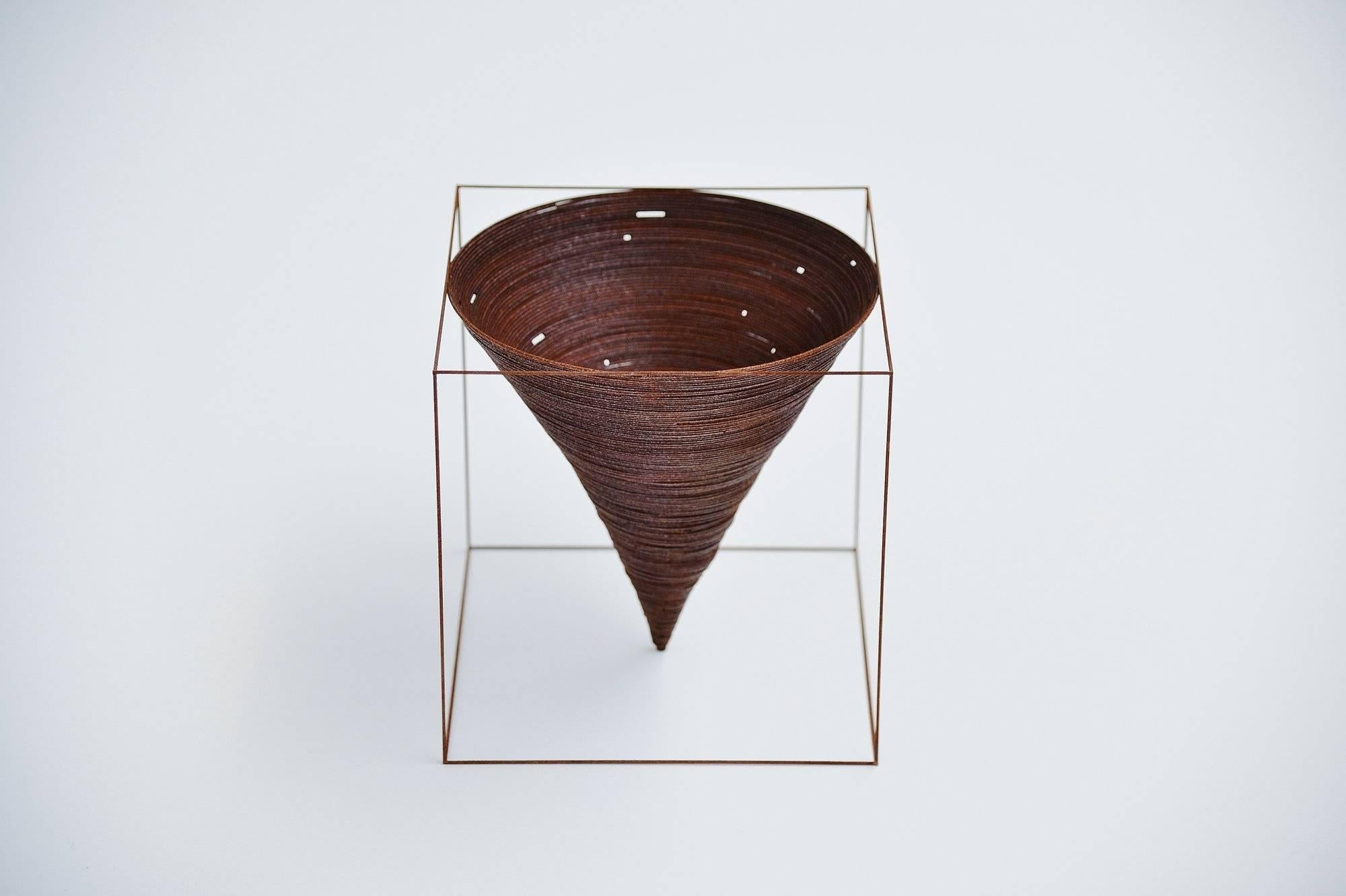 This is for a steel oxidated cube designed and made by Anne Rose Regenboog, Den Haag 2016. This cube is from a series of 4 unica's made of steel and is finished with oxidation to provoke the rust process and making these metal artworks all different