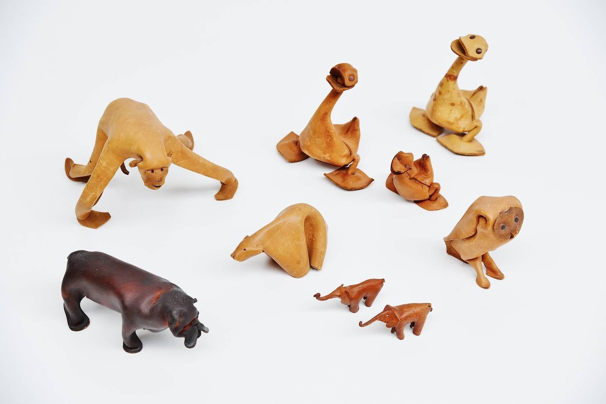 This is for a set of leather sculpted animals made by German company Deru in the 1960s. This set includes a monkey, owl, polar bear, Pitbull, three ducks and two small elephants. Deru made several different leather animals in the 1960s. They are