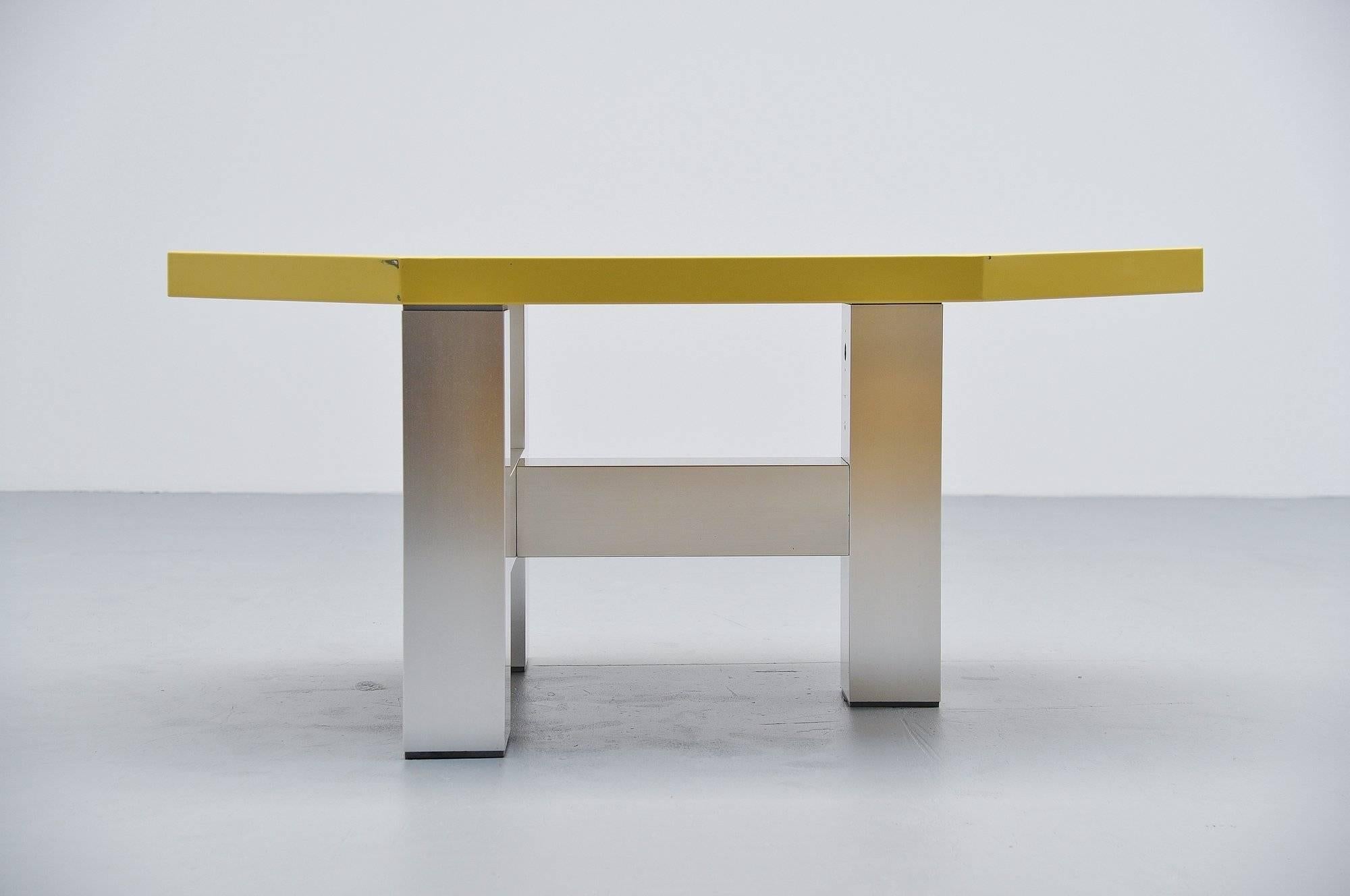 Rare modernist table designed by Martin Visser and Joke van der Heyden, manufactured by ’t Spectrum Bergeyk 1988. This table is model number TE21 and has an aluminium base and a yellow painted top with die cut dot pattern. Fantastic unusual shaped